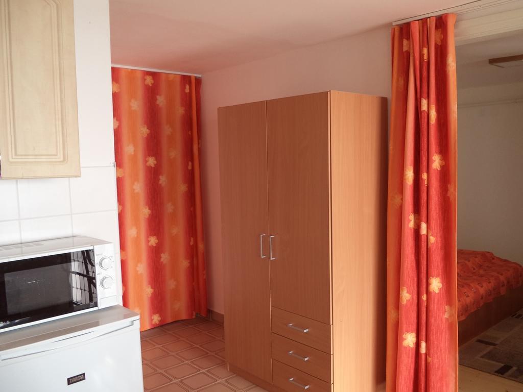 Napkelte Apartman Тихани Стая снимка