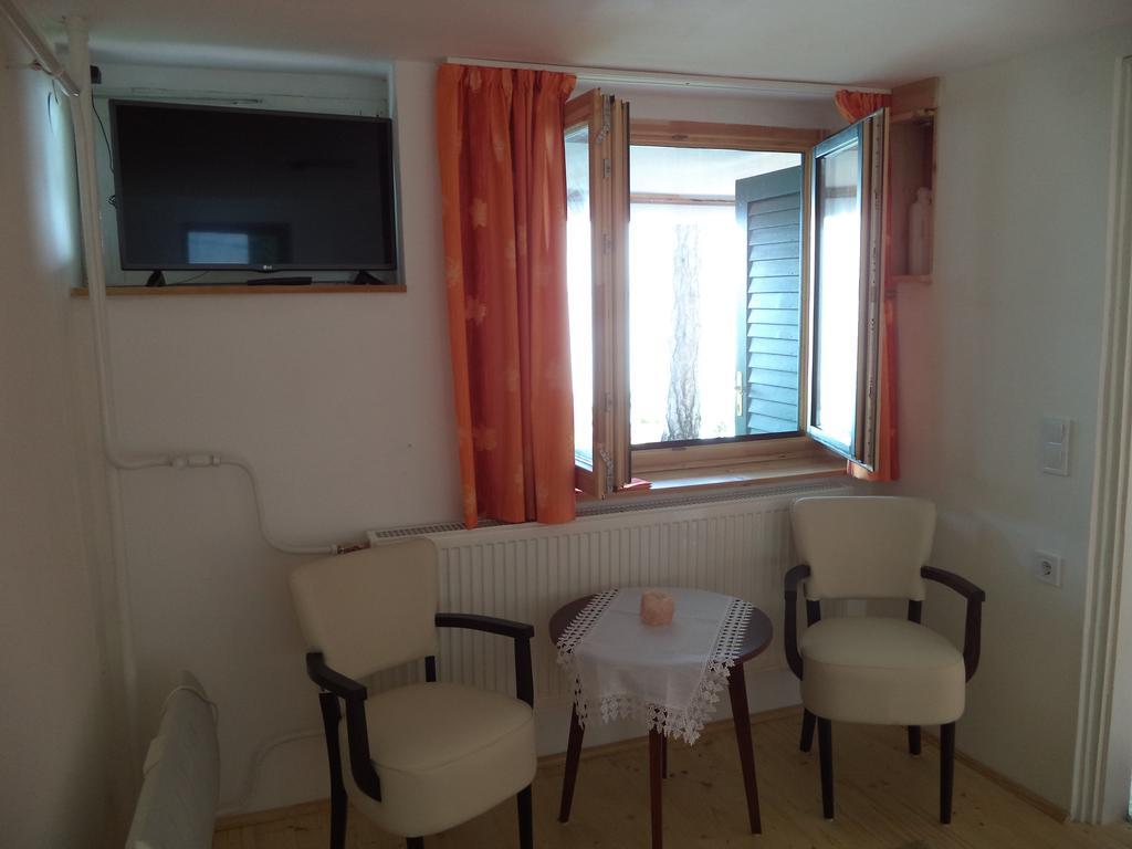 Napkelte Apartman Тихани Стая снимка